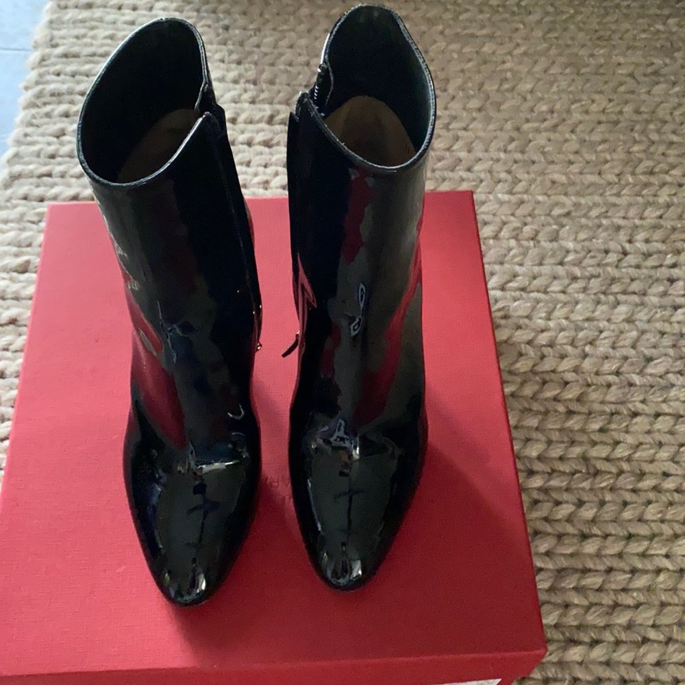 Valentino black patent leather booties.